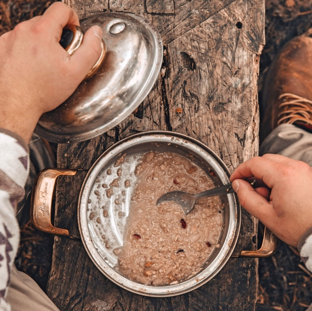 Eating oatmeal while camping