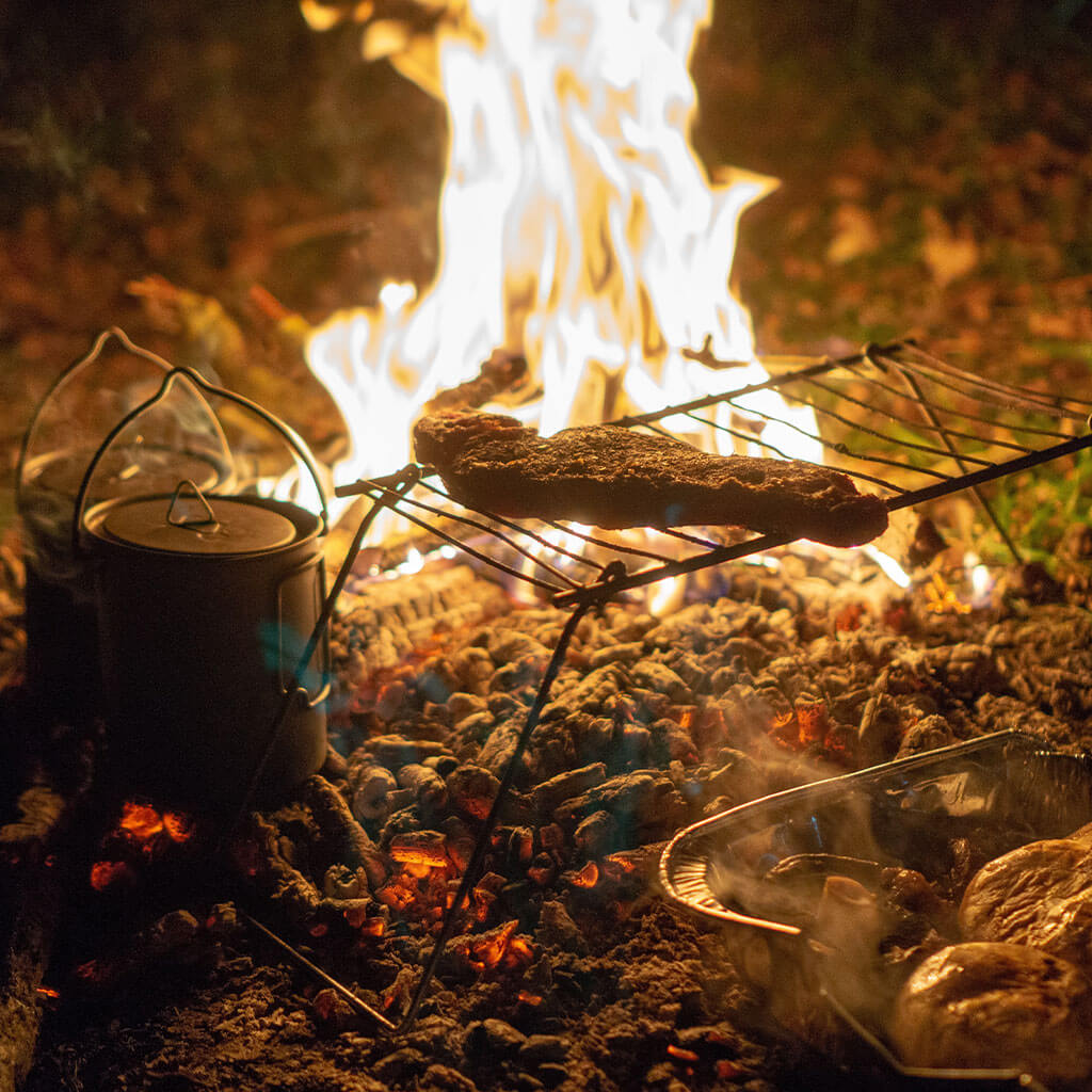 cooking over campfire in the backcountry