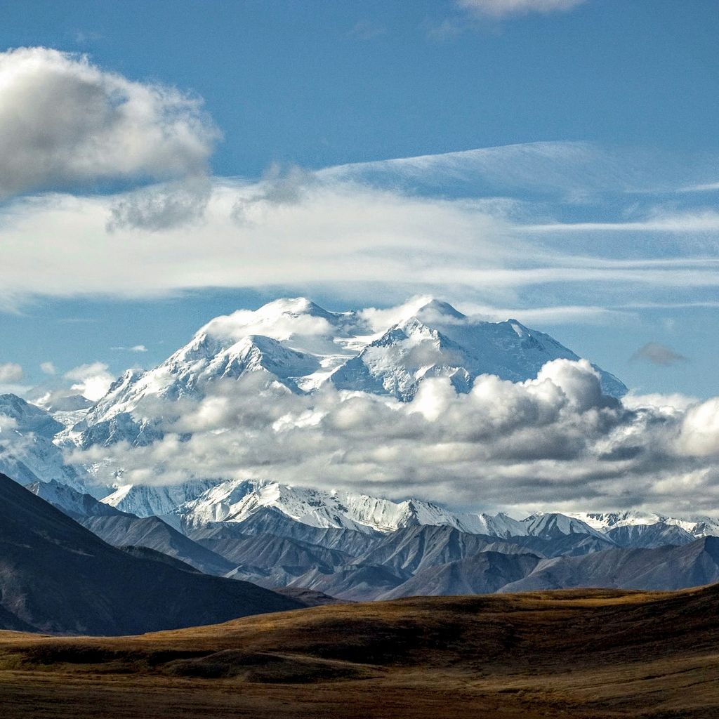Tall, snow-capped mountain range.