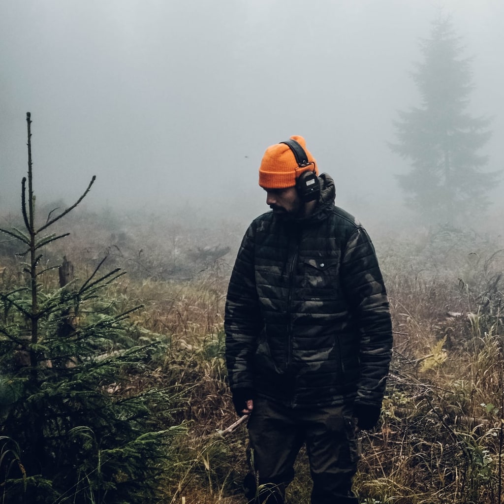 Man tracking a moose up north