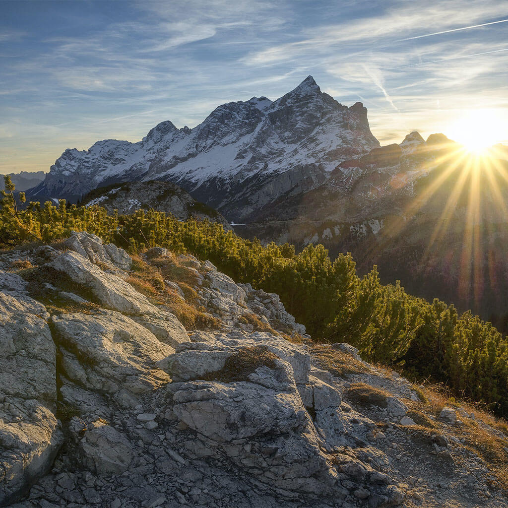 snow covered mountain at sunrise