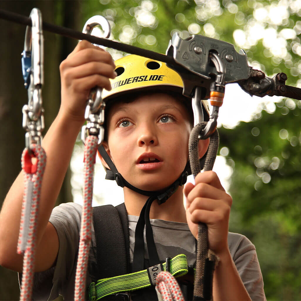 boy holding harness