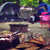 tents, camp chairs, firepit and firewood