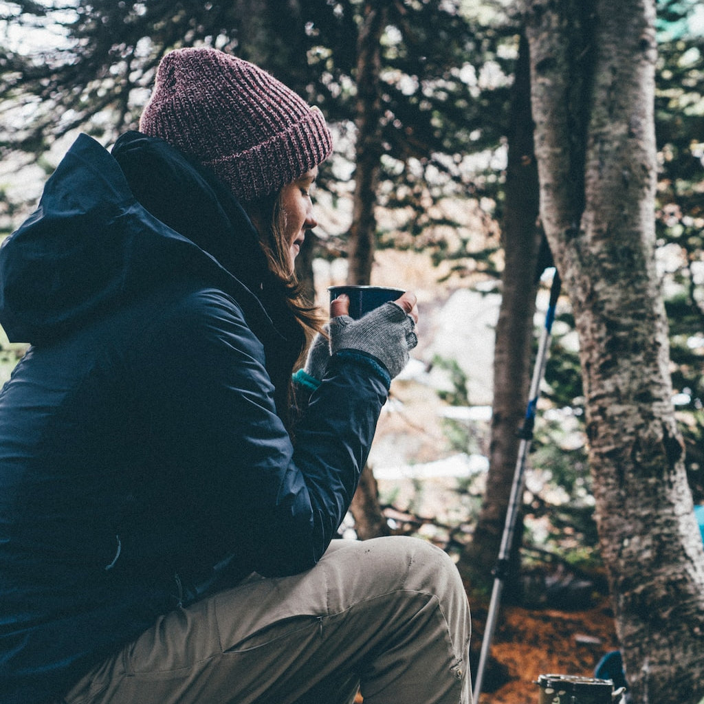 Camper drinking coffee in the morning.