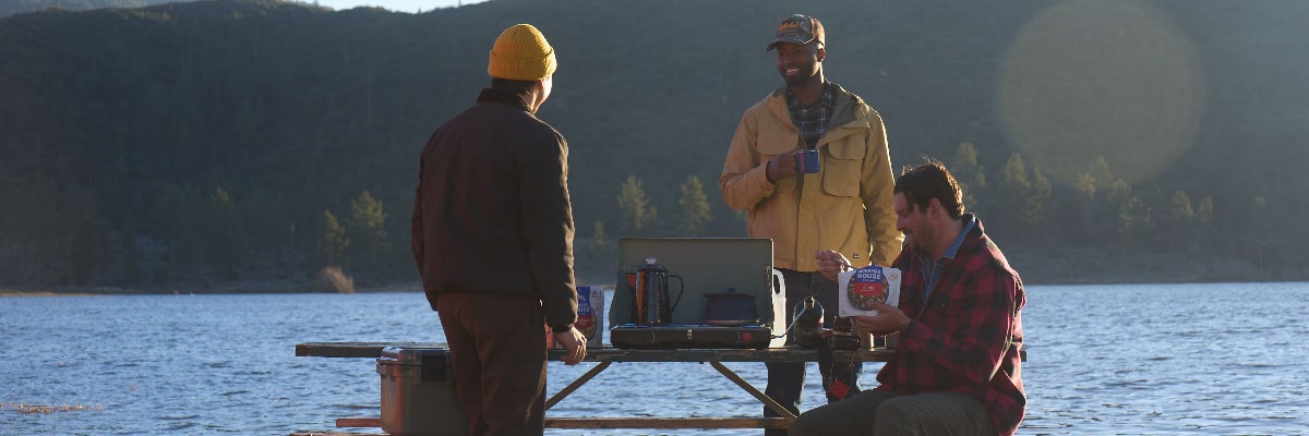 Backpackers eating Mexican-inspired camping meals.
