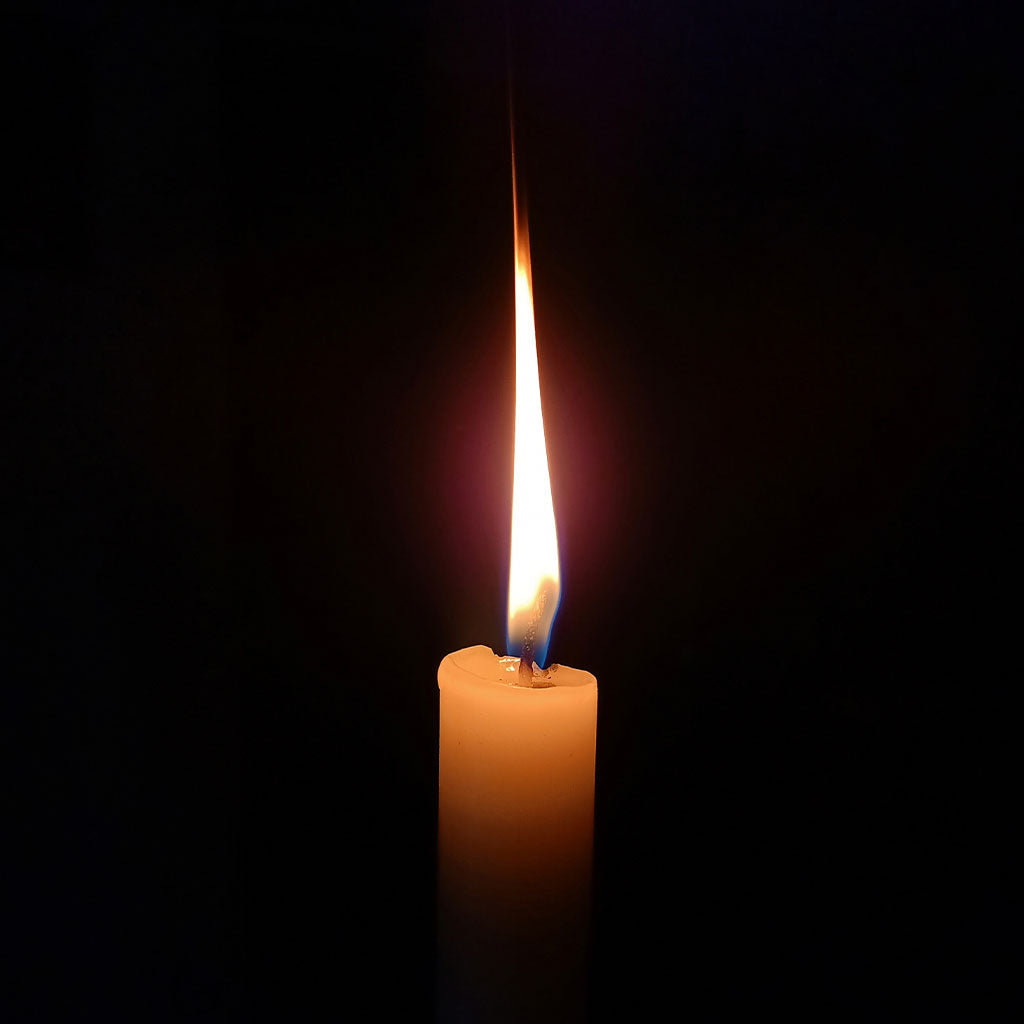 https://mountainhouse.com/cdn/shop/articles/lit-candle-during-power-outage-featured_1024x.jpg?v=1595969483
