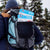 A man hiking with Mountain House in his backpack.