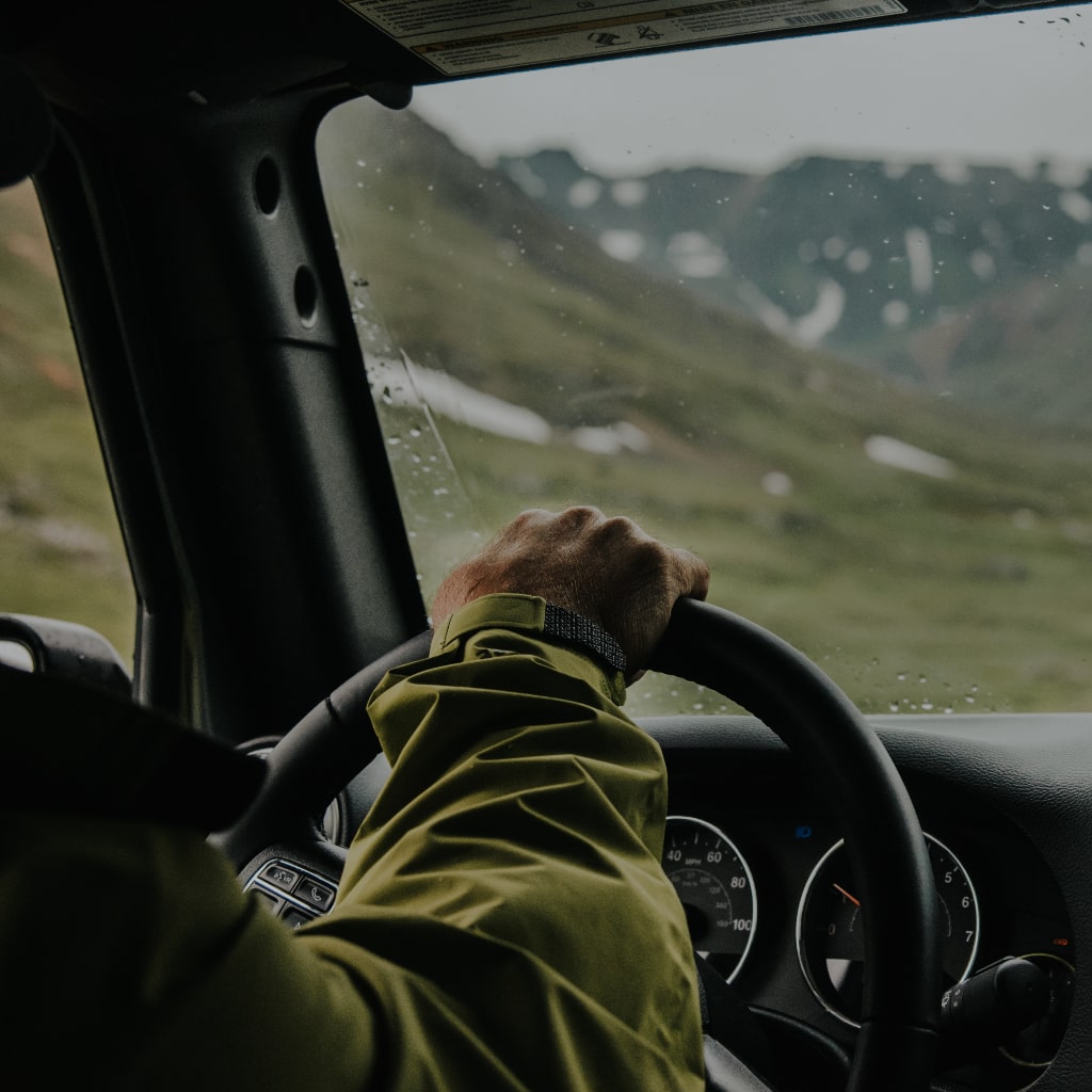 Person driving through backcountry