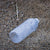 articles/plastic-water-bottle-in-sand-featured.jpg