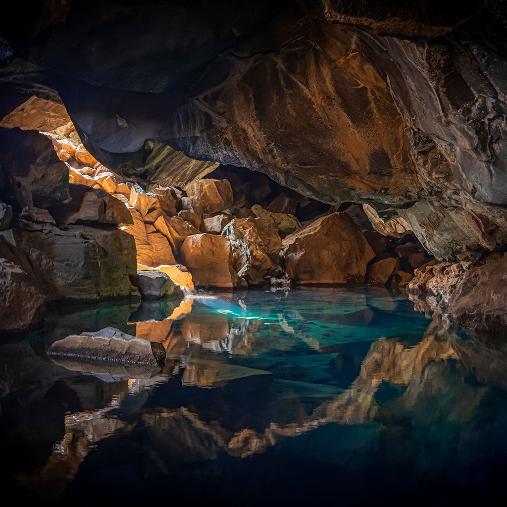 Underground cave with blue pool