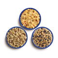 Aerial food shots of Breakfast Skillet, Beef Stroganoff with Noodles, and Granola with Milk & Blueberries in blue camping bowls.