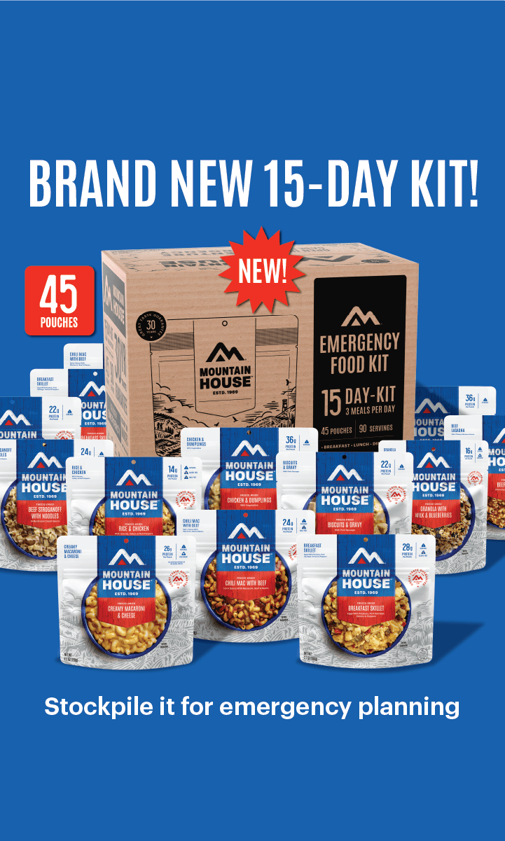 Mountain House 15-Day Emergency Food Supply Kit packaging with 45 pouches on a blue background. Text reads, "Band Ne 15-Day Kit! Stockpile it for emergency planning."