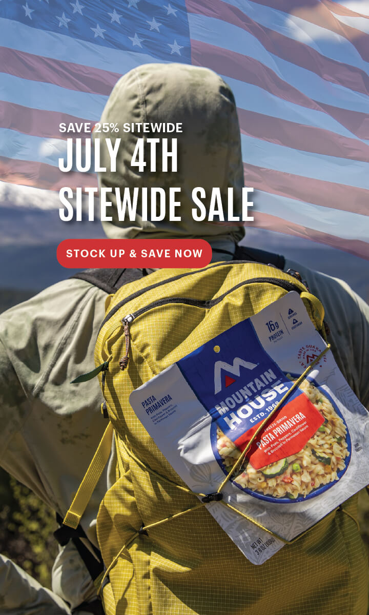 Person with yellow backpack and Mountain House pouch, with text promoting a 25% off sitewide July 4th sale.