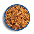 Mountain House Freeze-Dried Cheesy Beef Enchilada Bowl prepared in a blue camp bowl