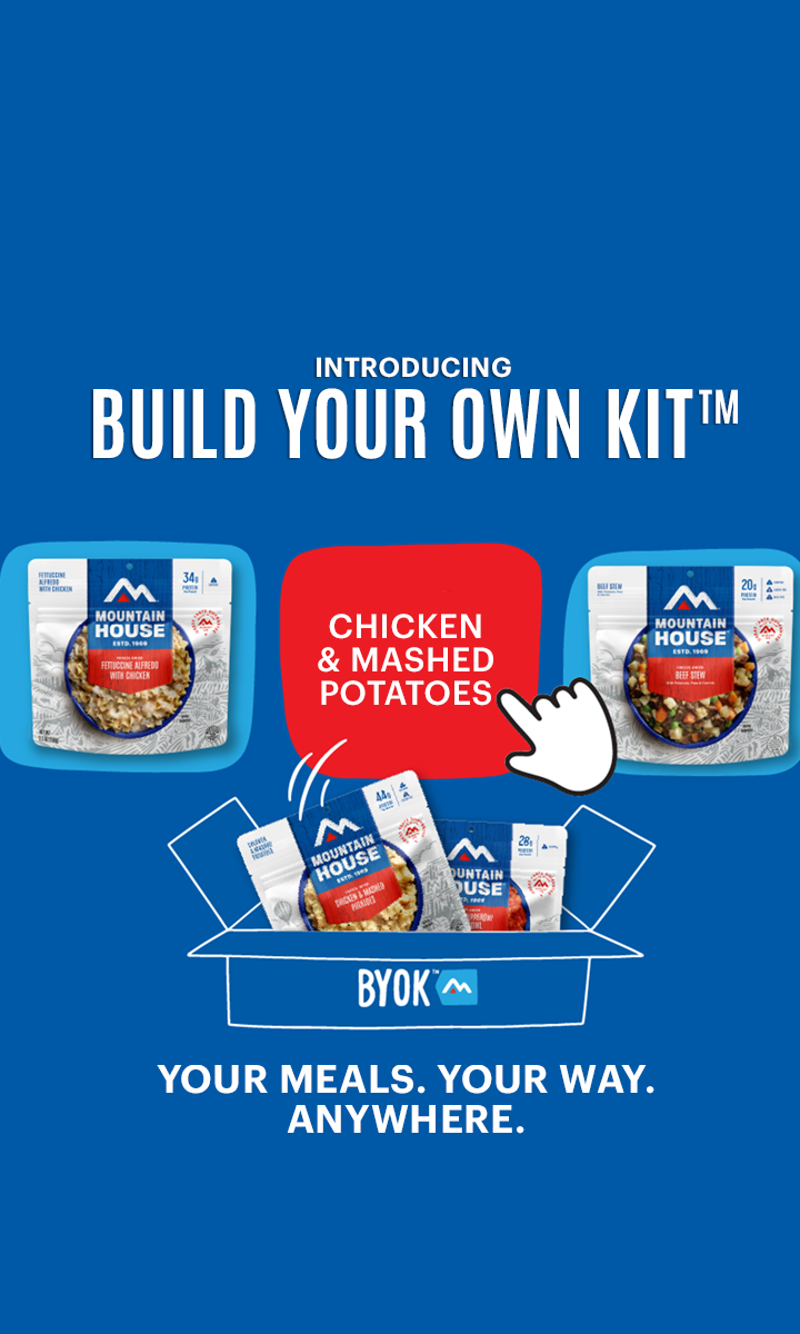 Various Mountain House meals being hand selected and placed in box. Text reads, "Introducing Build Your Own Kit™. Your Meals. Your Way. Anywhere." over a blue background.