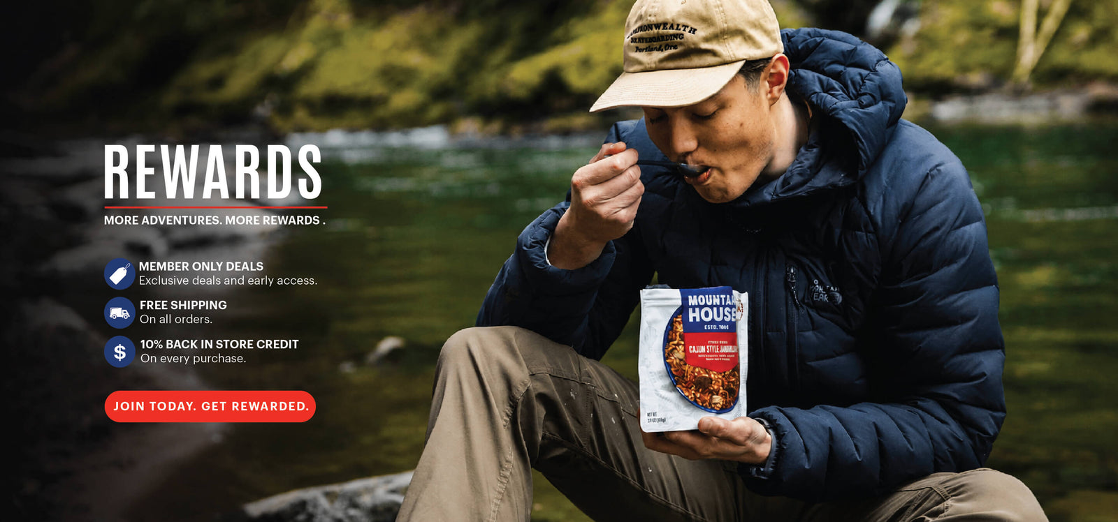 Person eating Mountain House Cajun Style Jambalaya by a river; Rewards program offers deals, free shipping, and credits.