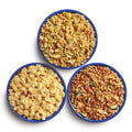 Three blue camping bowls filled with various Mountain House meals