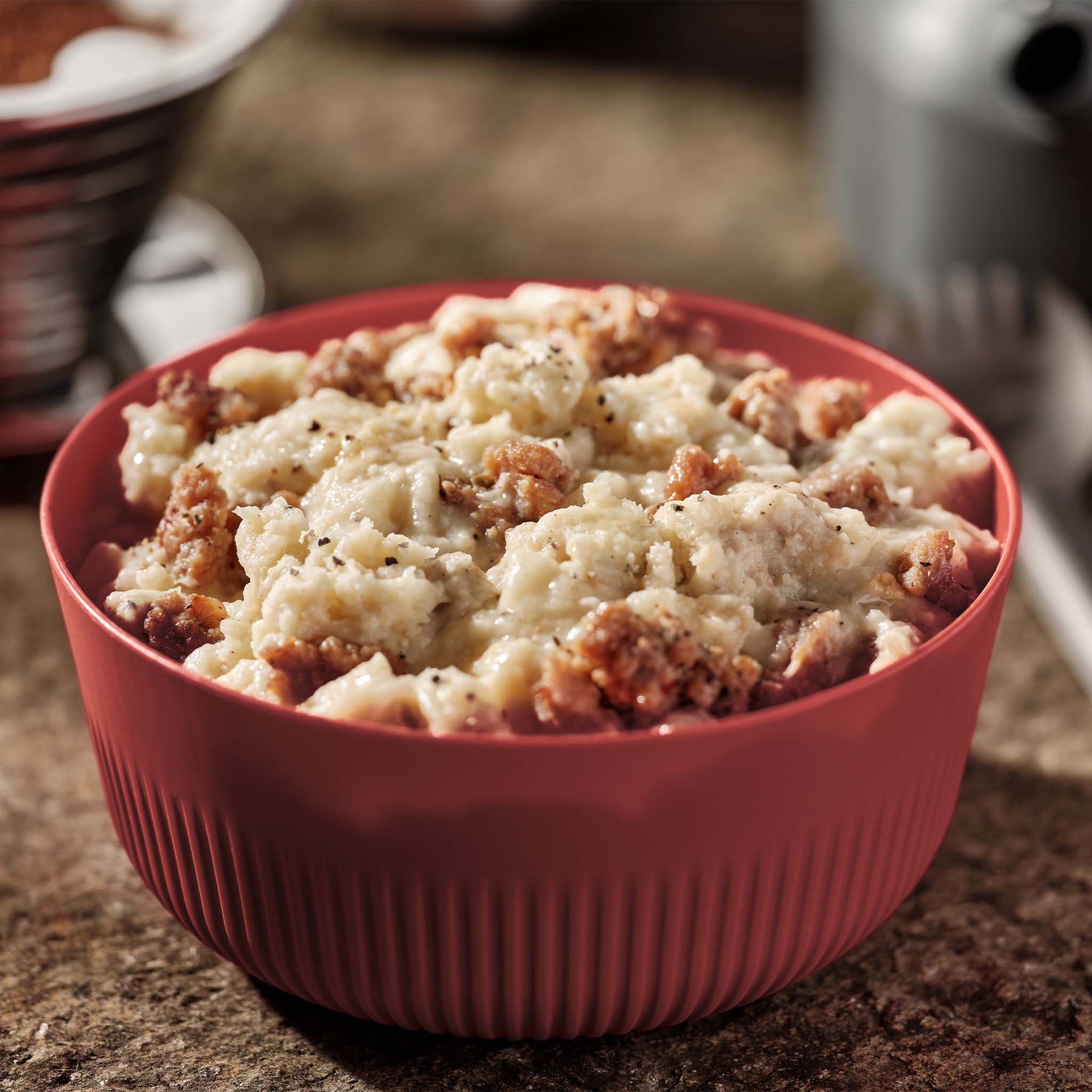 Mountain House Biscuits and Gravy prepared in a bowl.